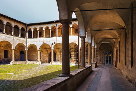 BERGAMO, ITALY - MAY 22, 2019: The old arcade courtyard of the former Saint Augustin monastery (Ex Monastero di Sant'Agostino), now is the University of Bergamo.のeditorial素材