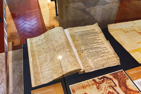 BERGAMO, ITALY - MAY 22, 2019: Ancient italian books in famous Bergamo library Biblioteca Civica Angelo Mai.のeditorial素材