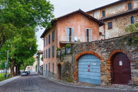BERGAMO, ITALY - MAY 22, 2019: View of the old residential historical buildings in Upper Bergamo (Citta Alta).のeditorial素材