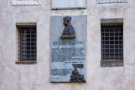 BERGAMO, ITALY - MAY 22, 2019: Memory plaque of the Umberto Utili on the building wall in Bergamo. He was an Italian general. He took part in the Greco-Italian War and in the Russian Campaign.のeditorial素材