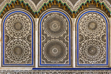 FEZ, MOROCCO - JUNE 02, 2017: Walls decorations of the Zawiya of Moulay Idris II (with the tomb of...