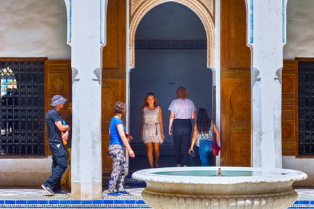 MARRAKESH, MOROCCO - JUNE 05, 2017: Unknown tourists in the The Bahia Palace. Is a late 19th century...