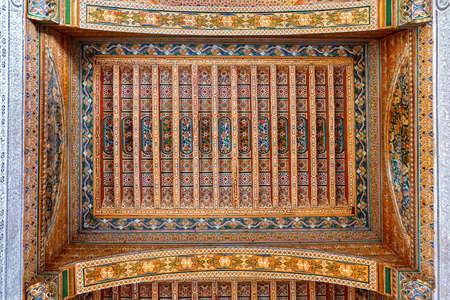 MARRAKESH, MOROCCO - JUNE 05, 2017: Decorated ceiling in the The Bahia Palace. Is a late 19th...