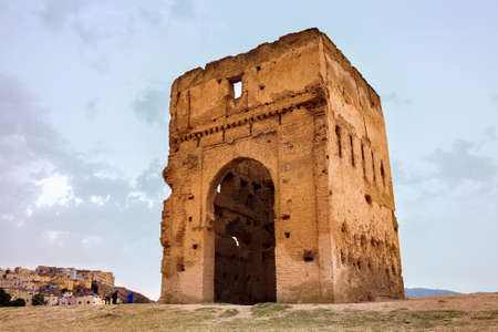 View of the Marinid Tombs ruins. It ruined tombs on a hill above and north of Fes al-Bali, the old city of Fez, Morocco. They were a royal necropolis for the Marinid dynasty (13th to 15th c.).の写真素材