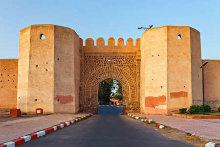 View of the yellow historical gate in the medina of Marrakesh on a sunny day. Morocco.の写真素材