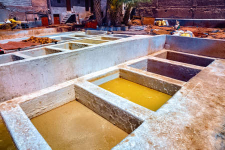 Old vats with a dye in the Marrakesh tannery. Morocco.の写真素材