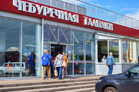 TALPAKI, RUSSIA - JUNE 12, 2016: Entrance to the famous fast food restaurant in Talpaki. The cafe specializes in Chebureki. Is a national dish of Tatar cuisine (fried turnover with a meat and onions).のeditorial素材