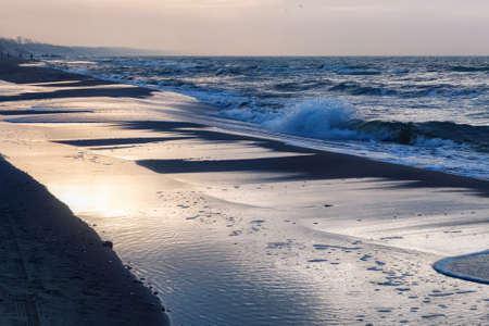 Beautiful view of the Baltic Sea coast on the Vistula Spit at the winter timeの写真素材