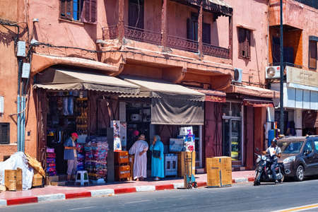 MARRAKESH, MOROCCO - JUNE 05, 2017: View of the red walls historical buildings in the medina of...