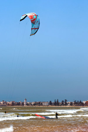 ESSAOUIRA, MOROCCO - JUNE 10, 2017: Kiteboarding activities on the Atlantic ocean waves in the Essaouira.のeditorial素材