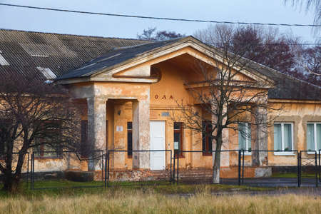 KOSA, BALTIC SPIT, RUSSIA - JANUARY 02, 2021: The old historic building of the former Primary School No. 3 on the Vistula spit. Now is the building of the history museum. Near Baltiysk.のeditorial素材