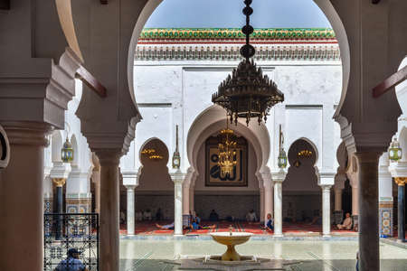 FEZ, MOROCCO - JUNE 02, 2017: Courtyard of the famous Zawiya of Moulay Idris II (contains the tomb...