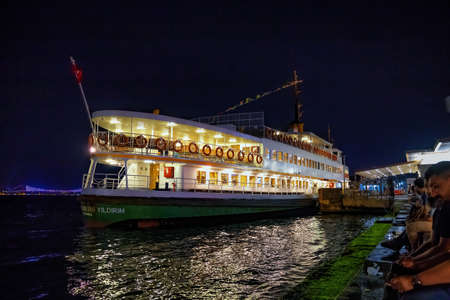 ISTANBUL, TURKEY - JULY 05, 2018: Night view of the old historic cruise vessel Ahmet Hulusi Yildirim...