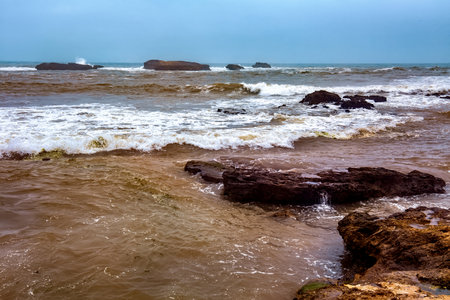 View of the volcanic shore of the Atlantic Ocean in the area of Essaouira in Morocco.の写真素材