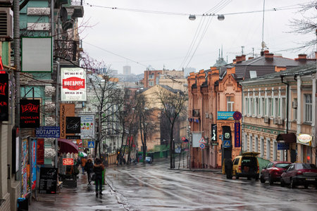 KYIV, UKRAINE - JANUARY 06, 2014: View of the historical streets in the center of the Kyiv in rainy winter day.のeditorial素材