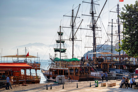 ANTALYA, TURKEY - JULY 08, 2018: Wooden ships waiting for a cruise in the Mediterranean Sea in the old city marina (Roman harbor). Boating is a very popular form of recreation in the Mediterranean.のeditorial素材