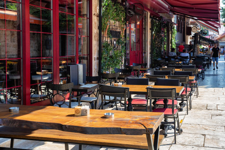 ANTALYA, TURKEY - JULY 08, 2018: One of the open air cafes in Kaleici (it is popular old historical quarter in Antalya).のeditorial素材