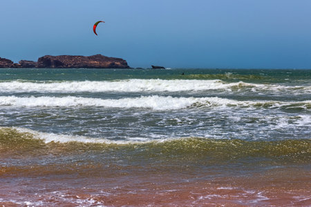 Kiteboarding activities on the Atlantic ocean waves in the Essaouira. Morocco.の写真素材