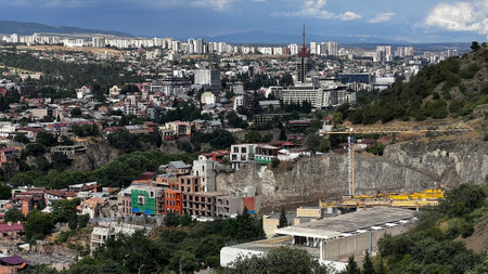 TBILISI, GEORGIA - JUNE 17, 2023: View of the cityscape on Tbilisi, the capital of Georgia.のeditorial素材