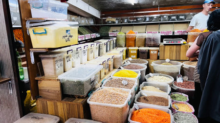 KUTAISI, GEORGIA - JUNE 21, 2023: Stalls with seasonings on the Green market in Kutaisi center.のeditorial素材