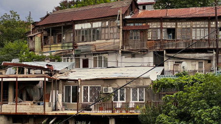 TBILISI, GEORGIA - JUNE 19, 2023: View of old shabby buildings of the Avlabari district in Tbilisi, the capital of Georgia.のeditorial素材