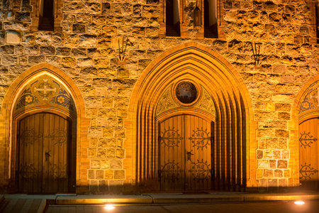 SOPOT, POLAND - DECEMBER 14, 2014: Details of Church of Sts. George in Sopot at night. Church was building in neo-gothic style in 1901, originally temple protestant, and since 1945 catholic.のeditorial素材