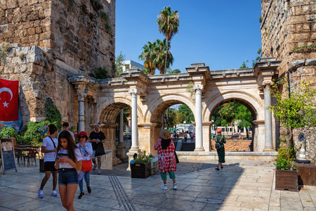 ANTALYA, TURKEY - JULY 08, 2018: Old roman Hadrian Gate in Kaleici. The Gate is a triumphal arch which was built in the name of the Roman emperor Hadrian, who visited the city in the year 130.のeditorial素材