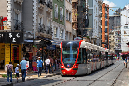 ISTANBUL, TURKEY - JULY 06, 2018: View of the Alstom Citadis 204 tram in the center of the Istanbul. The Alstom Citadis is a family of low-floor trams (streetcars) and light rail vehicles built by Alstom.のeditorial素材