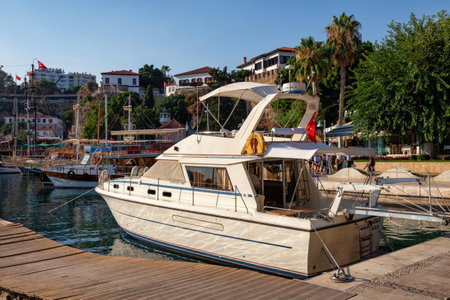 ANTALYA, TURKEY - JULY 08, 2018: Cruise motor boat in the old city marina (Roman harbor) of Antalya.のeditorial素材