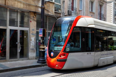 ISTANBUL, TURKEY - JULY 06, 2018: View of the Alstom Citadis 204 tram in the center of the Istanbul. The Alstom Citadis is a family of low-floor trams (streetcars) and light rail vehicles built by Alstom.のeditorial素材