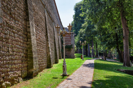 ISTANBUL, TURKEY - JULY 06, 2018: View of the ancient bricks walls in the Gulhane Park near the famous Topkapi Palace.のeditorial素材
