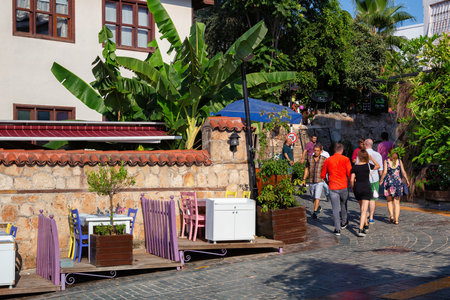 ANTALYA, TURKEY - JULY 08, 2018: Unknown tourists walking on the old streets of Kaleici. It is popular old historical quarter in Antalya.のeditorial素材