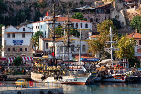 ANTALYA, TURKEY - JULY 08, 2018: Wooden ship waiting for a cruise in the Mediterranean Sea in the old city marina (Roman harbor). Boating is a very popular form of recreation in the Mediterranean.のeditorial素材