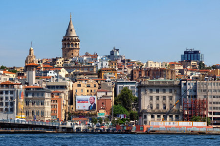 ISTANBUL, TURKEY - JULY 05, 2018: View of one of the most famous landmarks of Istanbul - the Galata Tower and the modern district Karakoy.のeditorial素材