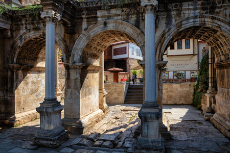 ANTALYA, TURKEY - JULY 08, 2018: Old roman Hadrian Gate in Kaleici. The Gate is a triumphal arch which was built in the name of the Roman emperor Hadrian, who visited the city in the year 130.のeditorial素材