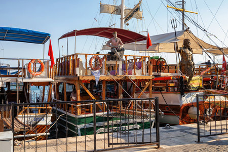 ANTALYA, TURKEY - JULY 08, 2018: Wooden ships waiting for a cruise in the Mediterranean Sea in the old city marina (Roman harbor). Boating is a very popular form of recreation in the Mediterranean.のeditorial素材