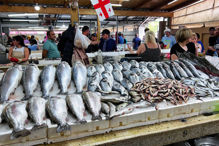 BATUMI, GEORGIA - JUNE 29, 2023: Stalls with fresh seafood at a local fish market in Batumiのeditorial素材