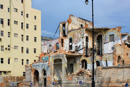 HAVANA, CUBA - MAY 15, 2012: View of one of the ruined buildings built in colonial style on one of the central streets in the historic part of Havana.のeditorial素材