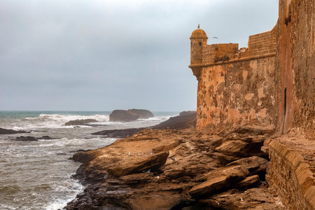 View of the ancient medieval walls on the Atlantic Ocean coast. Essaouira, Morocco.の写真素材