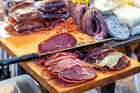 Pastirma sliced ââon a wooden board at a street market in Istanbul, Turkey.の写真素材