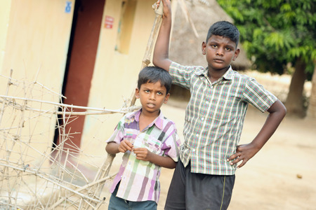 NANNILAM, INDIA - 11 MAY 2016: Portrait of happy kids outdoor looking at cameraのeditorial素材