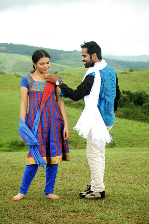 KODAIKANAL, INDIA - JUNE 30TH, 2015: Young couple having fun at outdoors,のeditorial素材