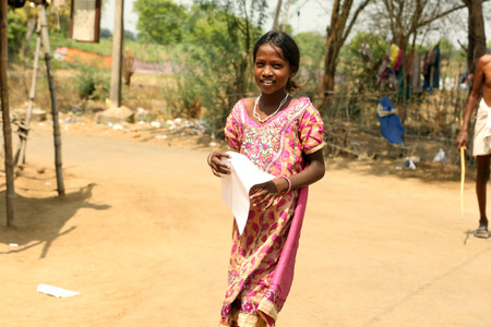 NANNILAM, INDIA - 19 MAY 2016: Unidentified Happy Indian rural school girl at their Village, Nannilam, Indiaのeditorial素材