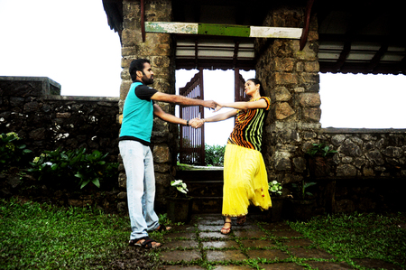 OOTY, INDIA - 30 JUNE, 2015: Young couple having fun at outdoors, actor acting at shooting movieのeditorial素材