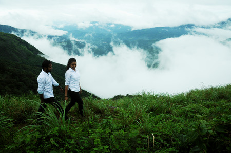 KODAIKANAL, INDIA - JUNE  30TH, 2015: happy young loving couple having fun outdoor in summertimeのeditorial素材