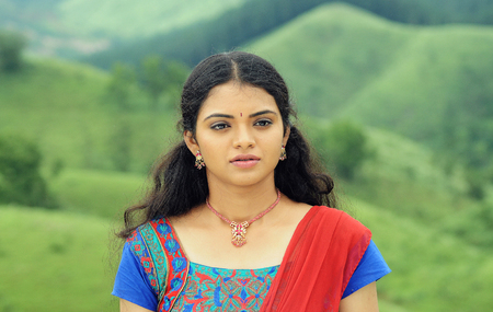 KODAIKANAL, INDIA - 30 JUNE, 2015: sad woman looking at cameraのeditorial素材