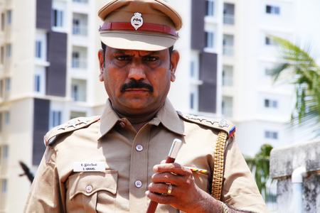 Indian police officer looking at outsideのeditorial素材