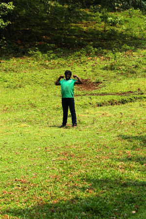 Portrait of a young man showing his strength in outdoorのeditorial素材