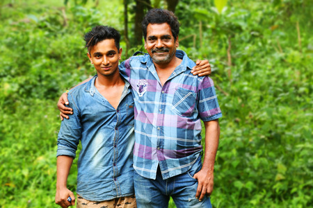 KODAIKANAL, INDIA - JUNE 29TH, 2015: Handsome young man looking at cameraのeditorial素材