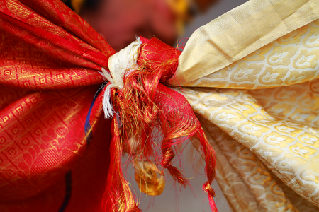 Young couples tie the knot at mass weddingの写真素材